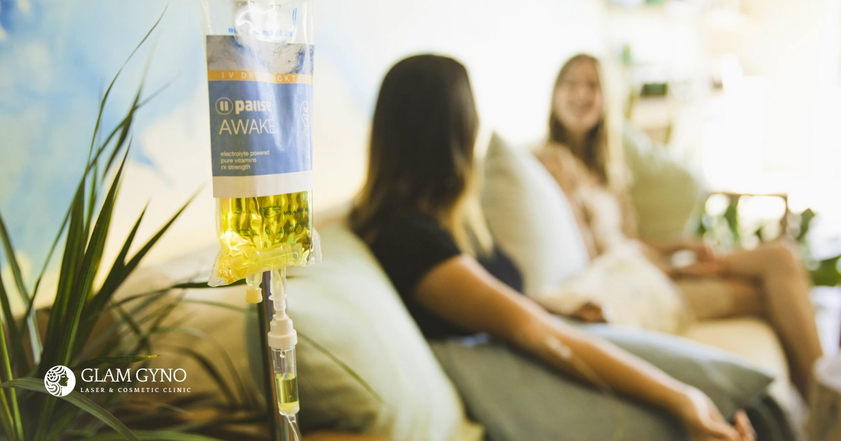 Woman experiencing mental fatigue and stress relief during IV therapy at a wellness clinic in Goa